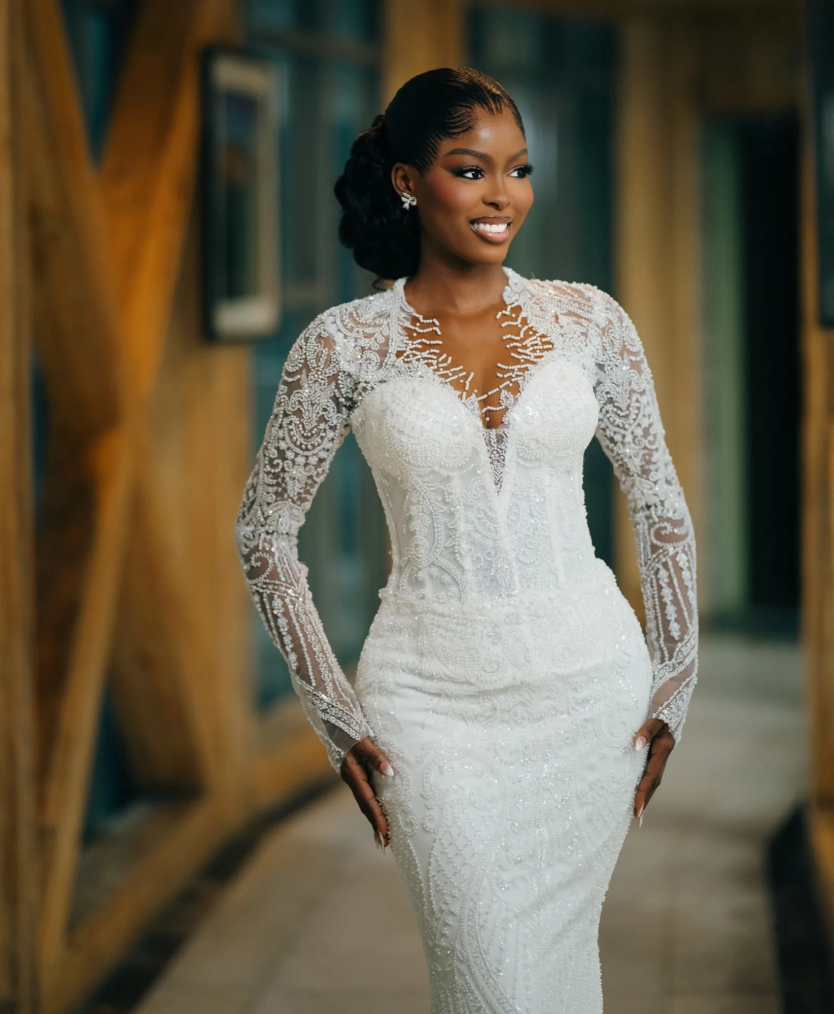 Two days, two ceremonies, one couple. A blush garden white wedding, then a coral-and-red Igbo traditional.