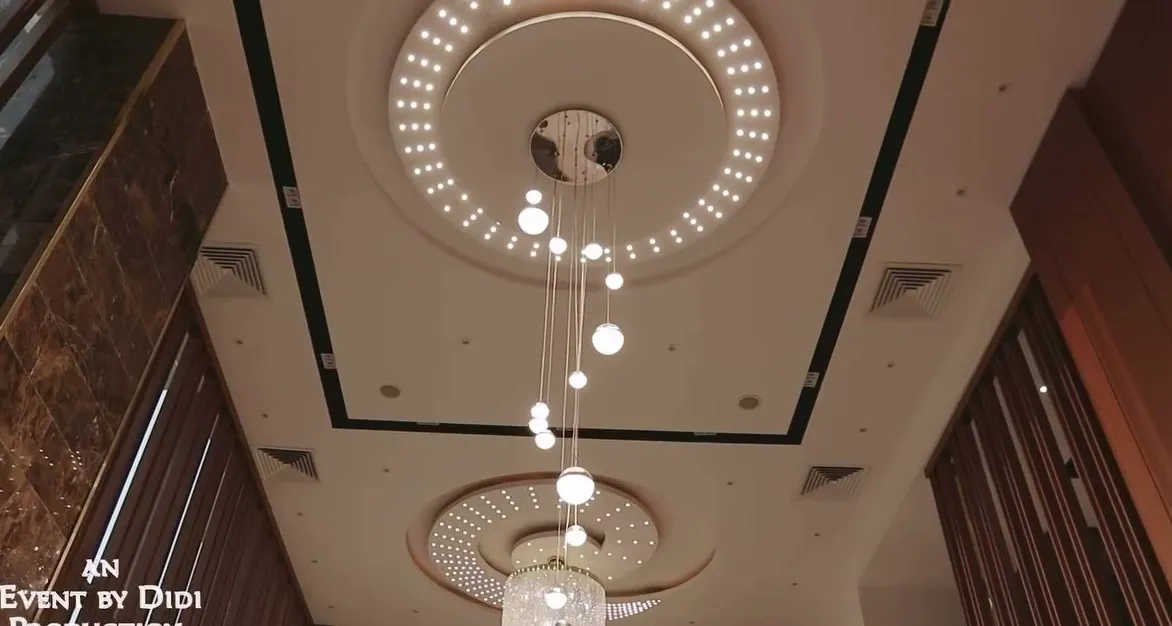 A crystal chandelier glowing over the venue