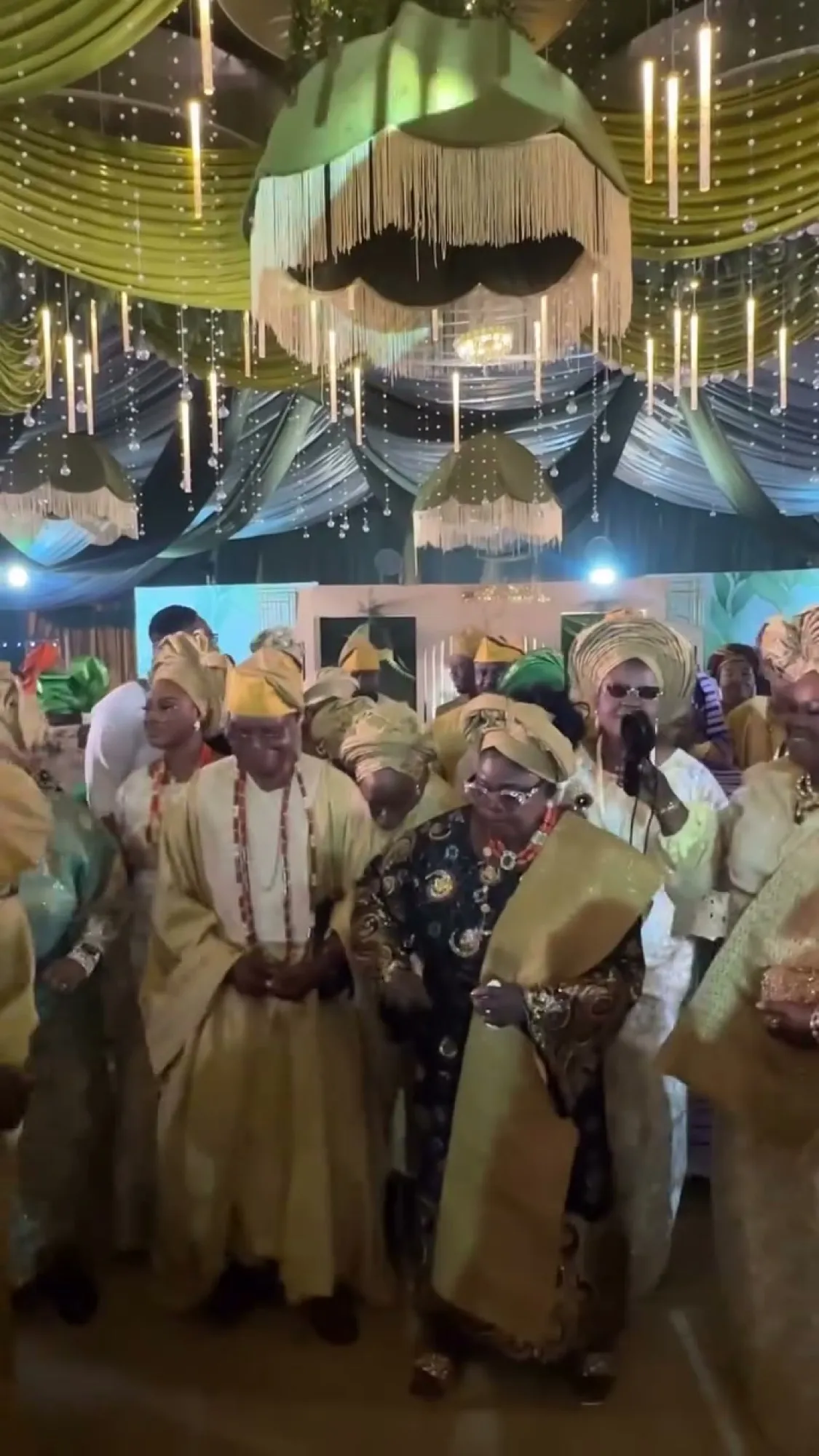 Eighty years, one family and a hall full of lampshade chandeliers, live band and gold.