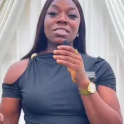 Didi speaking to guests at an event